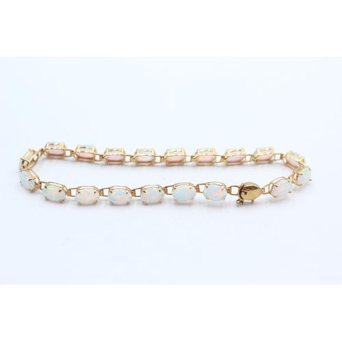 133 - 14ct gold opal panel bracelet (4.6g)