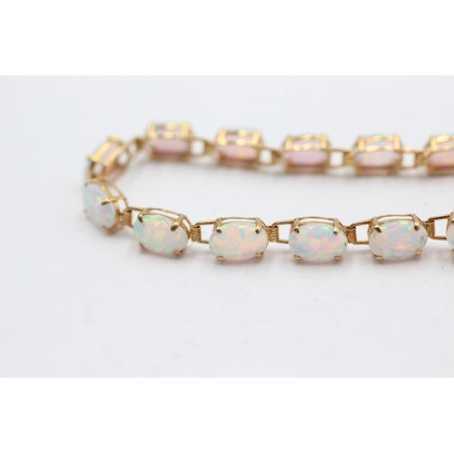 133 - 14ct gold opal panel bracelet (4.6g)