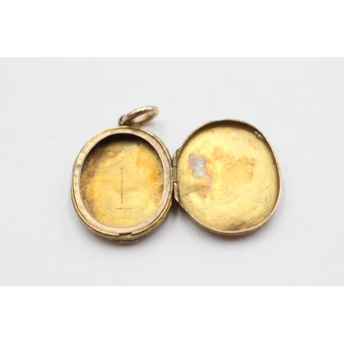 135 - 18ct gold back & front antique locket (3.2g)