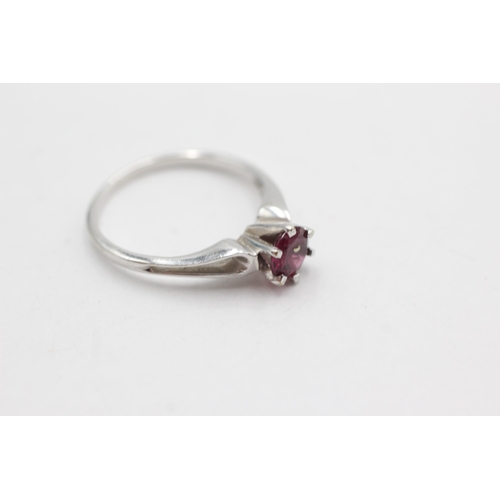 143 - 9ct white gold garnet solitaire ring (2.2g)  Size  O