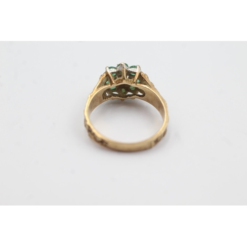 146 - 9ct gold diamond & emerald floral cluster ring (2.8g)  Size J