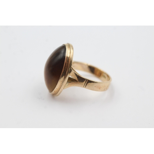 148 - 14ct gold tiger's eye solitaire ring (6.1g)  Size J