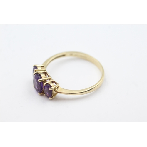 157 - 9ct gold amethyst trio ring (2.7g)  Size  W