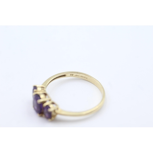 157 - 9ct gold amethyst trio ring (2.7g)  Size  W