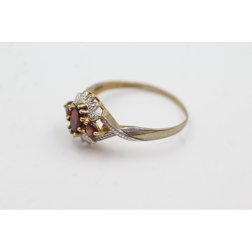 159 - 9ct gold diamond & garnet fronted ring (2.1g)  Size  U