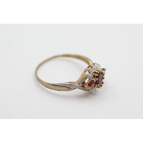 159 - 9ct gold diamond & garnet fronted ring (2.1g)  Size  U