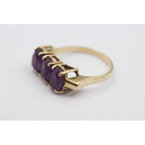 160 - 9ct gold amethyst trio fronted ring (4.7g)  Size U