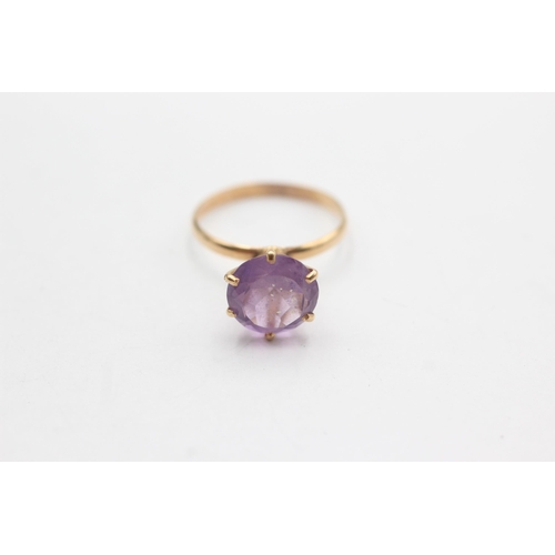 161 - 18ct gold prong set amethyst ring (2.2g)  Size  M