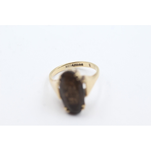 166 - 9ct gold smokey quartz dress ring (4.6g)  Size O