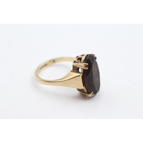 166 - 9ct gold smokey quartz dress ring (4.6g)  Size O