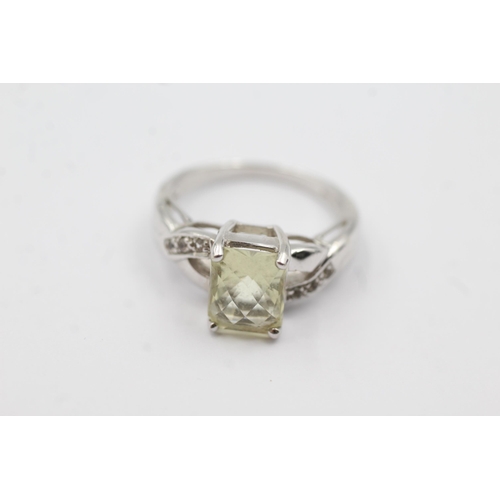 167 - 9ct white gold diamond & orthoclase feldspar ring (4.7g)  Size  N