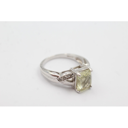 167 - 9ct white gold diamond & orthoclase feldspar ring (4.7g)  Size  N