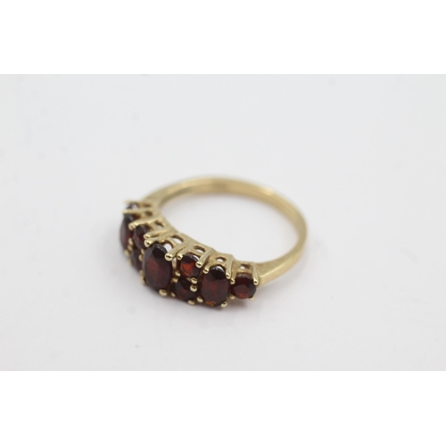 173 - 9ct gold garnet fronted ring (2.4g)  Size  K