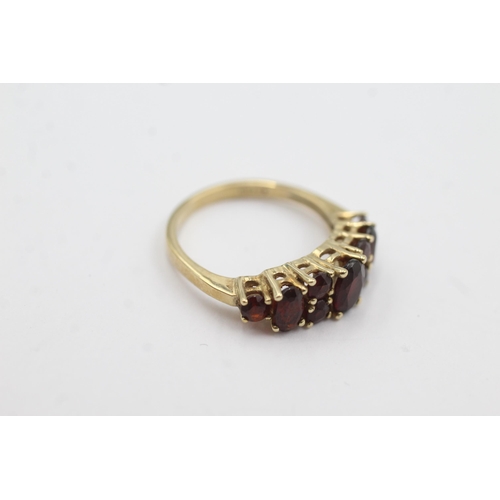 173 - 9ct gold garnet fronted ring (2.4g)  Size  K