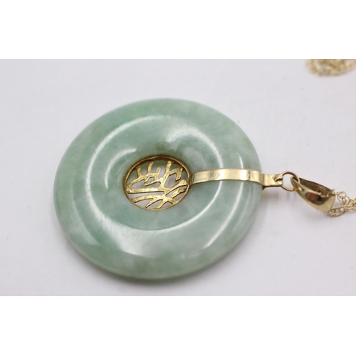 184 - 14ct gold jade pendant on chain (8.6g)