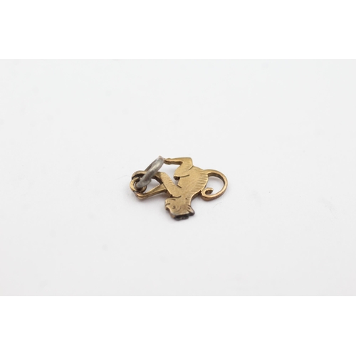 185 - 9ct gold monkey charm (0.6g)