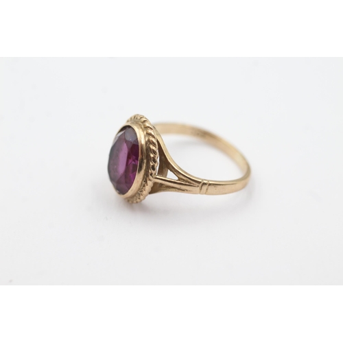 196 - 9ct gold amethyst rope framed ring (2.4g)  Size H