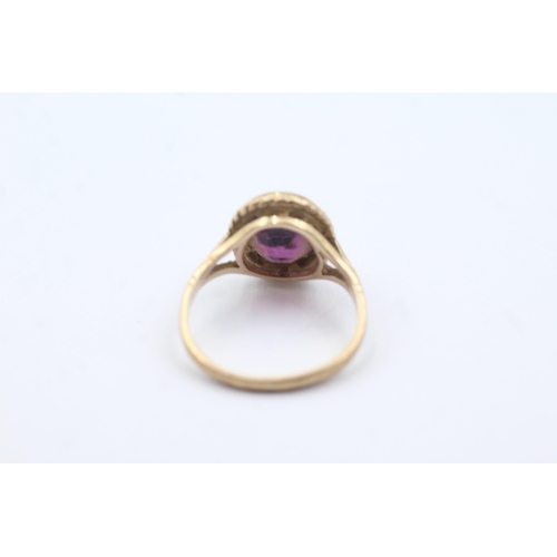 196 - 9ct gold amethyst rope framed ring (2.4g)  Size H