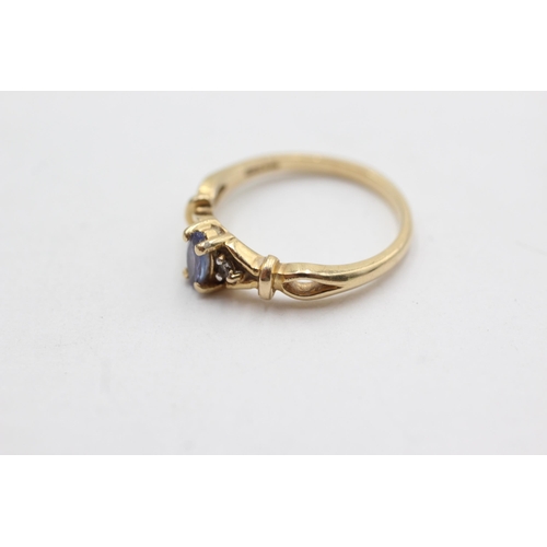 197 - 9ct gold diamond & tanzanite ring (2.6g)  Size  M