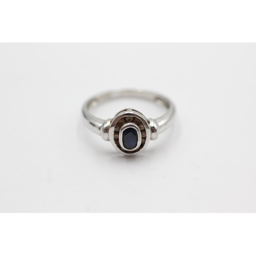 21 - 9ct white gold sapphire & diamond halo ring (2.4g)  Size  M