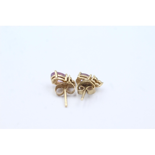 222 - 9ct gold amethyst & diamond stud earrings (0.9g)