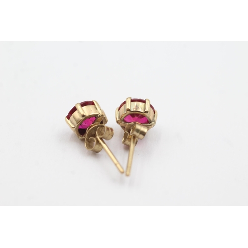 228 - 9ct gold synthetic ruby stud earrings (2.3g)