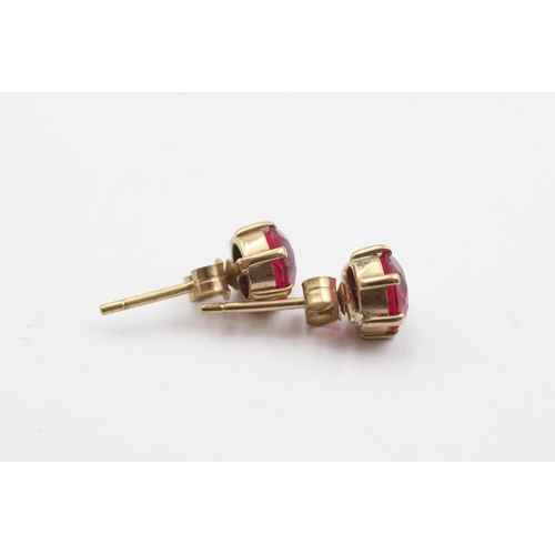 228 - 9ct gold synthetic ruby stud earrings (2.3g)