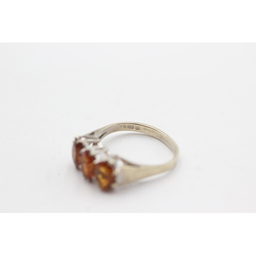 247 - 9ct gold citrine trio fronted ring (2.9g)  Size  L