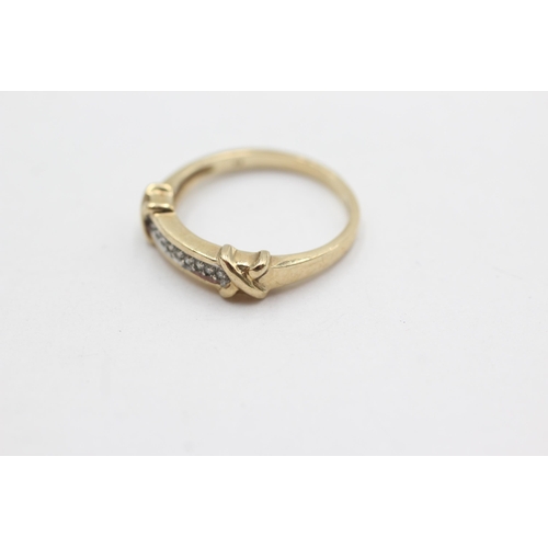 252 - 9ct gold diamond fronted band ring (2.3g)  Size O