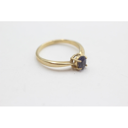 261 - 9ct gold iolite solitaire ring (2g)  Size  N