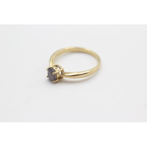 261 - 9ct gold iolite solitaire ring (2g)  Size  N