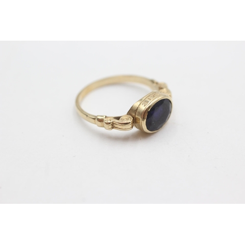 263 - 9ct gold amethyst 'amet amie' friendship ring with scroll framing (3.1g)  Size  R