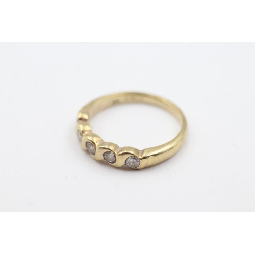 298 - 9ct gold diamond fronted band ring (3.1g)  Size Q