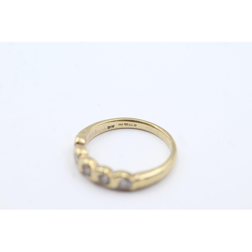 298 - 9ct gold diamond fronted band ring (3.1g)  Size Q