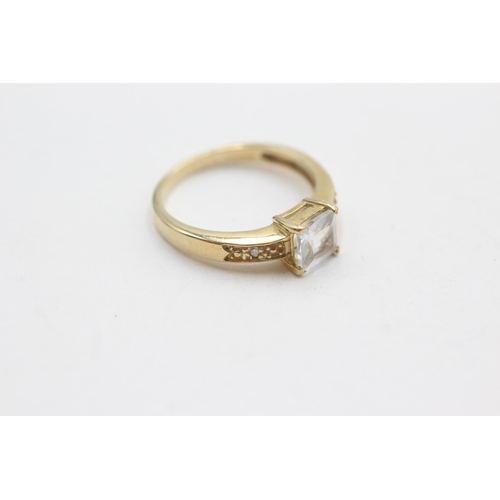 299 - 9ct gold diamond sided aqua ring (2.5g)  Size  N