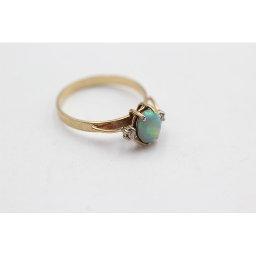 31 - 9ct gold opal & diamond dress ring (1.5g)  Size  M