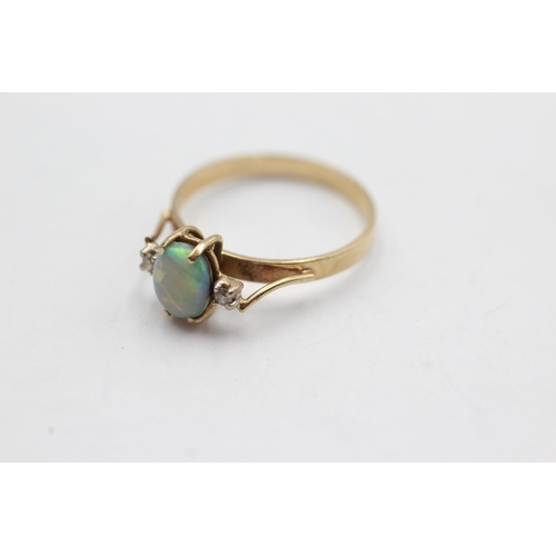 31 - 9ct gold opal & diamond dress ring (1.5g)  Size  M