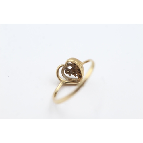 322 - 9ct gold diamond heart ring (2.1g)  Size N