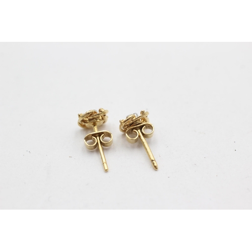 338 - 18ct gold clear gemstone stud earrings (1.3g)