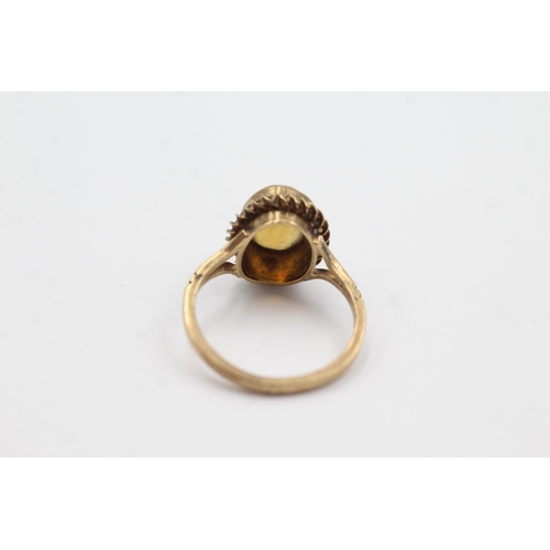 344 - 9ct gold citrine rope framed ring (2.7g)  Size M