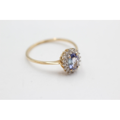 45 - 9ct gold clear gemstone & tanzanite halo ring (2.1g)  Size  U