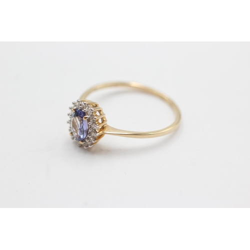 45 - 9ct gold clear gemstone & tanzanite halo ring (2.1g)  Size  U