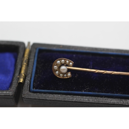 67 - 15ct gold antique pearl detail stick pin with 9ct pin (0.9g)