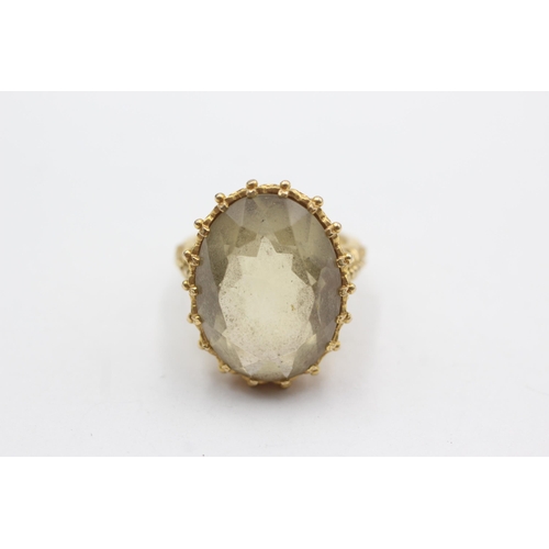 69 - 9ct gold smoky quartz cocktail ring (8.6g)  Size  N