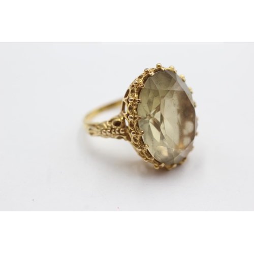 69 - 9ct gold smoky quartz cocktail ring (8.6g)  Size  N