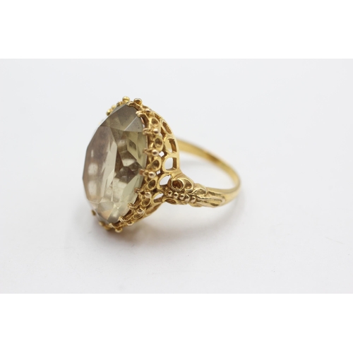 69 - 9ct gold smoky quartz cocktail ring (8.6g)  Size  N