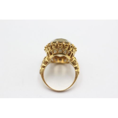 69 - 9ct gold smoky quartz cocktail ring (8.6g)  Size  N