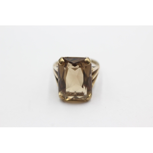 71 - 9ct gold smoky quartz cocktail ring (7.6g)  Size  M