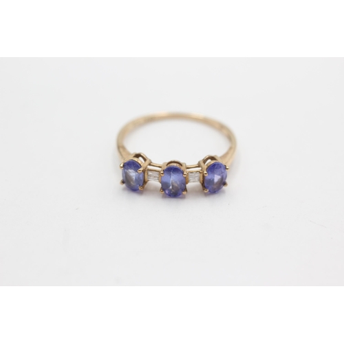 74 - 9ct gold diamond & tanzanite ring (2.1g)  Size T