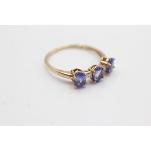 74 - 9ct gold diamond & tanzanite ring (2.1g)  Size T